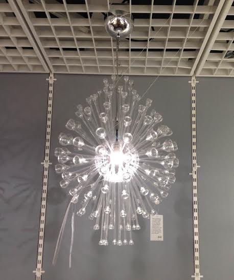 The glasses look like little trumpets jumping out of the light!